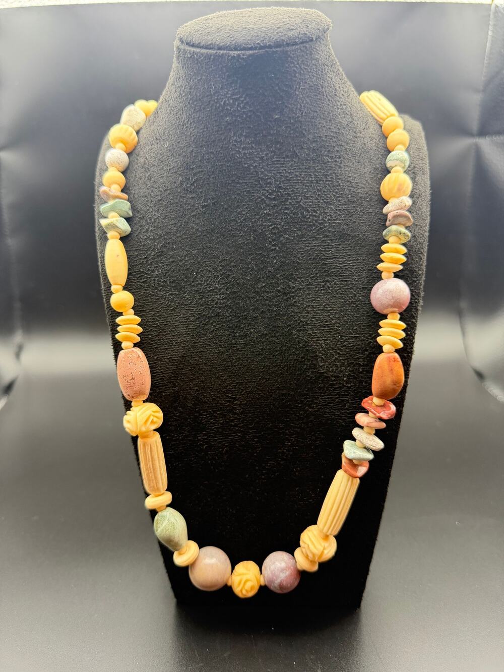 Vintage necklace with pastel colored stone and carved beads summer style